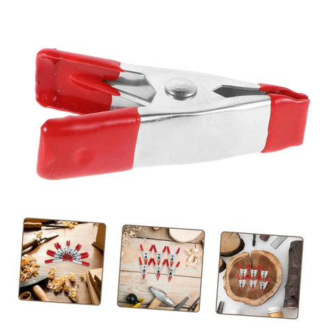 12 Pack Heavy Duty Metal Spring Clamps Kit For Woodworking Pros And DIY Gurus Offering Insane Grip Power For Crafts Dress Fitting Garlands And Household Projects You Need Right Now red metal spring clamp close-up