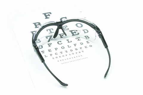 Genesis Series Reader Style Safety Glasses With Bifocal Lenses One To Three Diopters Dual 9 Base displayed on eye chart