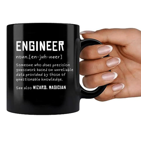 Engineer Definition Ceramic Mug 11 Oz Black Funny Gift For Engineering Students And Pros with humorous engineer definition text.
