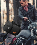 Motorcyclist with Waterproof 30L Motorcycle Dry Bag With Roll Top Closure Air Valve And Quick Fix Straps Rugged All Weather Gear