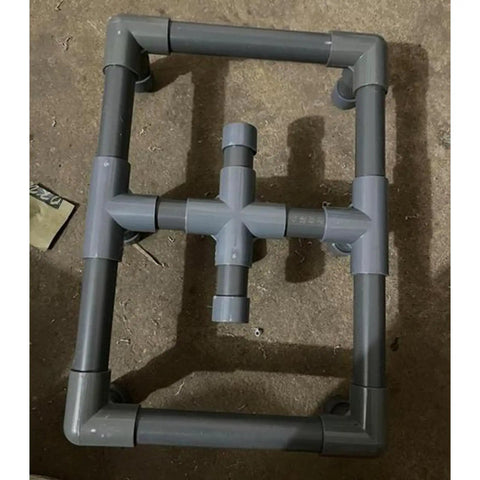 Assembled frame with six pieces three quarter inch grey electrical conduit PVC pipe seventeen inches long Sch40 rigid tube round pipes.
