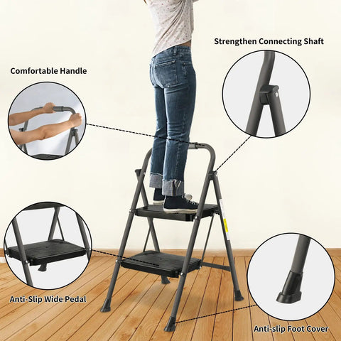 Person using a two step folding ladder with non slip wide pedal and rubber feet, lightweight steel stool with sponge safety handrail, 330 lb capacity, portable multi use ladder for home and office, gray, indoors.
