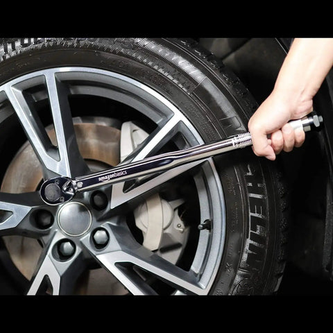 Beefy 1/2-Inch Drive Click Torque Wrench With Audible Click And High Accuracy, 25-250 ft-Lb Range used on car tire