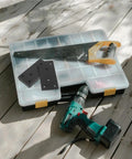 Heavy Duty Stainless Steel Mending Plates, Flat Metal Brackets For Quick Cabinet Fixing And Wood Repair, tools and brackets on a work surface.