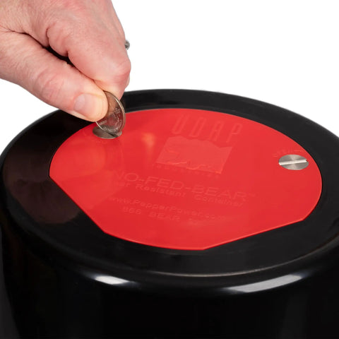 Securing lid of Bear Resistant Food Storage Canister For Hiking Camping And Backpacking, 2 Gallon Capacity With Carrying Case