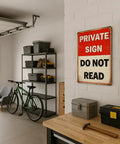 Funny Private Sign Do Not Read Tin Metal Wall Decor Vintage Rustic Distressed Hella Cool Art Piece for Man Cave Bedroom Bar Dorm Office Gift 12 by 8 Inch mounted in a garage setting.