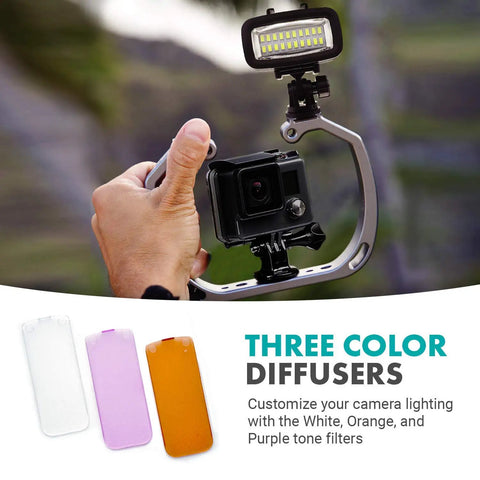 Person holding GoPro with Underwater LED Video Light 700 Lumen High Power Waterproof, showing three color diffusers.