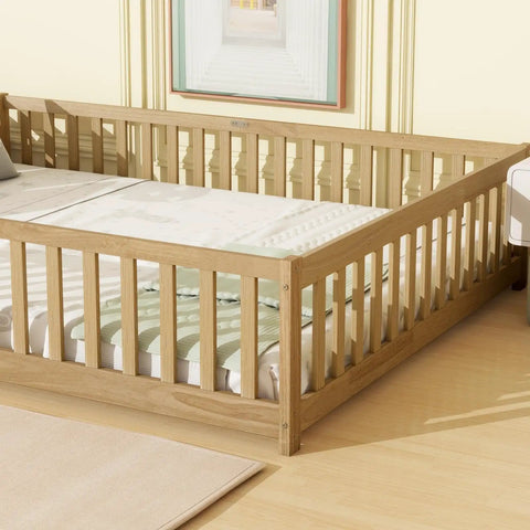 Queen Floor Bed With Safety Guardrails in Natural Rubber Wood Finish with mattress in modern bedroom setting