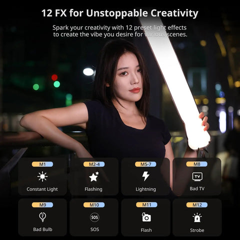 Person holding Bi Color 20W Inflatable LED Tube Light For On The Go Filming Portable Handheld Magnetic Mount in urban setting