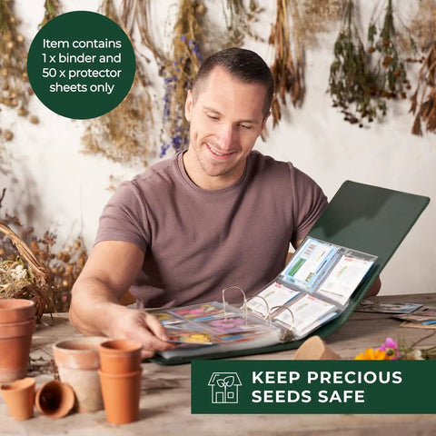 Man holding Big Capacity Seed Packet Organizer Binder With 50 Heavy Duty Sheet Protectors That Holds 200 Seed Envelopes in a garden setting