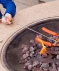 Marshmallow Roasting Sticks Set Of 2 With Multiple Attachments For Campfire S'Mores Pie Roaster And Hot Dog BBQ in use