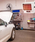 Cranks Out 5000W Garage And Workshop Heater With Remote, Digital Control, Fan Forced Heat, Wall Or Ceiling Mount, 9 Hour Timer, Overheat Protection, ETL Listed, Wide 50 Sq M Coverage For Fast, Even Warmth installed in a garage.