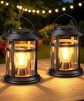 2 Pack Solar Lanterns Outdoor Waterproof Hanging Lights For Garden Patio Porch Decor Warm White LED on wooden table at night