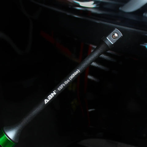 Close-up of a 65 ft-lb torque bar from the Half-Inch Drive 8 Inch Long Torque Limiting Socket Extension Bar Set, Color-Coded 5-Piece Kit for Tight Spots.
