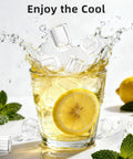 No Fuss Countertop Ice Maker Pumping Out 18 Lbs Of Crisp Bullet Ice Every 6 Minutes in a fresh drink with lemon and mint.