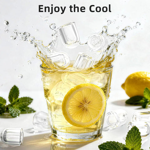 No Fuss Countertop Ice Maker Pumping Out 18 Lbs Of Crisp Bullet Ice Every 6 Minutes in a fresh drink with lemon and mint.