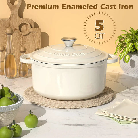 Cream White Enameled Cast Iron Dutch Oven 5 Quart With Lid And Cotton Potholders on kitchen counter