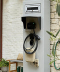 Built Tough Aluminum EV Charger Cover And All Weather Sun Shield For Wall Mounted Electric Vehicle Stations on brick wall.