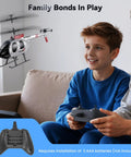 Beginner Friendly RC Helicopter With Auto Hover And Altitude Hold in flight, boy playing indoors with remote control.