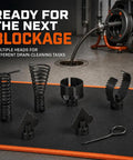 Superior Serrated Drain Cleaning Cutter Heads Built Tough As Nails To Bust Nasty Clogs Fast For Professional Sewer Line Maintenance And Heavy Duty Plumbing Solutions. Multiple drain cutting heads displayed on mat.