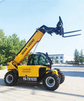 Heavy Hitter Multi Purpose Telehandler With Hydraulic Boom Telescopic Forklift Built For Rough Outdoor Work Sites And Custom Load Rigging, side view with raised fork.