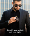 Man holding AirTag Wallet With RFID Blocking For Men Minimalist Slim Bifold Money Clip Full Grain Leather Front Pocket Card Organizer Durable Everyday Carry Gift For Tech Nerds.