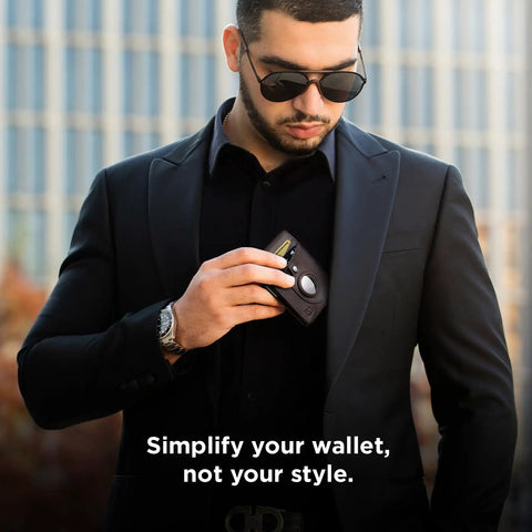 Man holding AirTag Wallet With RFID Blocking For Men Minimalist Slim Bifold Money Clip Full Grain Leather Front Pocket Card Organizer Durable Everyday Carry Gift For Tech Nerds.