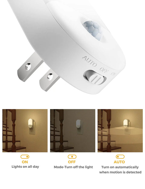 Close-up of a plug-in night light with the 'Auto' mode switch, part of the 4 Pack Plug In Motion Sensor Night Light With 3000K Warm White.