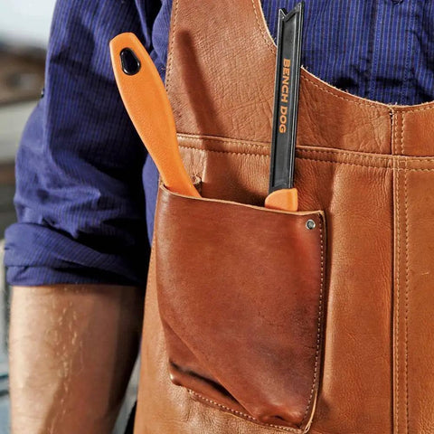 Pocket Push Stick For Table Saw With Mounting Hole in leather apron pocket, non slip ergonomic handle. Essential woodworking tool for safety.