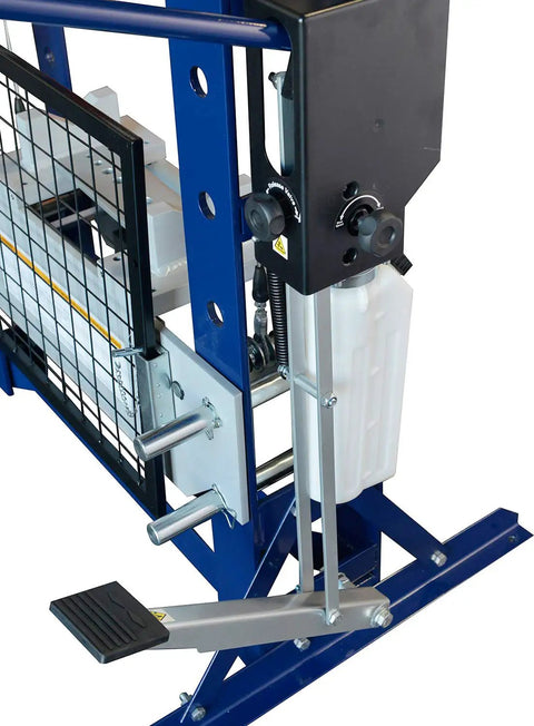 Supercharged Steel H Frame Pneumatic Air Hydraulic Garage Shop Press Slams Through Tough Metals With Foot And Hand Pump Pedal 30 Ton 60000 Lb Capacity Adjustable Base For Shop Daily Grind close-up of foot pedal and hydraulic components