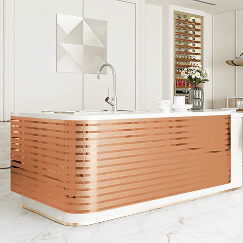 Ridiculously Sleek Rose Gold Metallic Peel And Stick Wall Panels Shimmer Stripe used as a backsplash on a kitchen island.