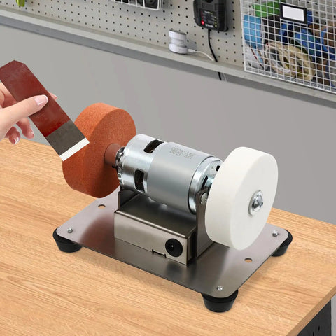 Heavy Duty Mini Belt Sander, Kickass Electric Benchtop Grinder With Dual Coarse And Fine Wheels, Fast Variable Speed Control, user grinding a tool.