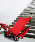 Ditch The Struggle With This Heavy Duty Electric Stair Climbing Hand Truck For Easy Moving Loads That Fold Up Small And Powers You Up Any Flight In Style, red electric stair climbing hand truck on stairs.