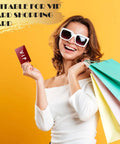 Smiling woman in white top holding shopping bags and VIP card, suitable for using 100 Piece Colorful Aluminum Engraving Blanks For Laser Etching.