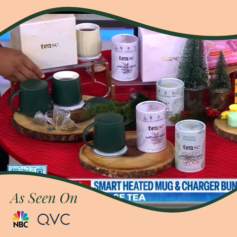 Self Heating Mug With Phone Controlled Heat Settings And Wireless Charging Stand To Keep Your Morning Brew Piping Hot All Day Long Sip At Your Pace While This Rechargeable Tech Build Keeps Every Drop Cozy And Fresh on a display with tea accessories.