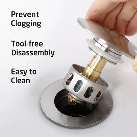Close-up of Bathroom Sink Drain With Strainer Basket Hair Catcher Anti Clog Pop Up Stopper in brushed nickel, stainless steel design.