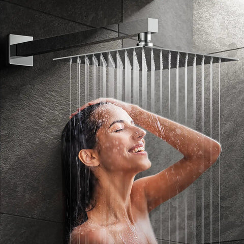 Woman enjoying All-In-One Bathroom Rain Shower System with 12 inch square shower head, chrome wall mount, high pressure water flow