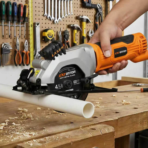 Extbtfor power circular saw with laser guide, orange body, cutting PVC pipe on a wood workbench.