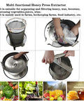 Smooth Operator Manual Honey Press And Beeswax Extractor Machine With Heavy Duty Stainless Steel Frame plus nylon filter bags in use with fruit and juice.