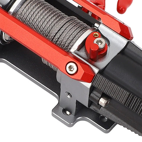 Close-up of a dual motor RC winch showcasing the realistic CNC metal build and alloy body for 1/10 and 1/8 scale off-road cars.