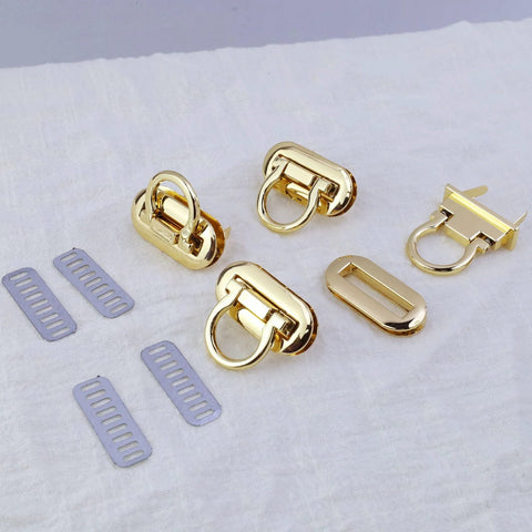 Gold turn-lock purse clasps with rings, 4-piece set, for DIY handbags; includes lavender strap slides.
