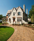 Real Deal Wet Look High Gloss Concrete And Paver Sealer For Exterior Patios featuring five gallon container near paved driveway.