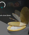 Smooth Ride Silver Foil Glitter Toilet Seat With Soft Close Hinges And Quick Release Mounting For Standard Elongated Bowls open on toilet.