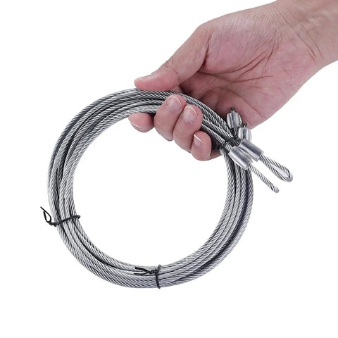 Hand holding galvanized cable from Garage Door Cable And Pulley Replacement Kit With Two Pairs Of Galvanized Aircraft Cables And Four Heavy Duty Three Inch Pulleys And Fasteners For Torsion And Extension Doors Up To 12 And 9 Feet DIY Ready