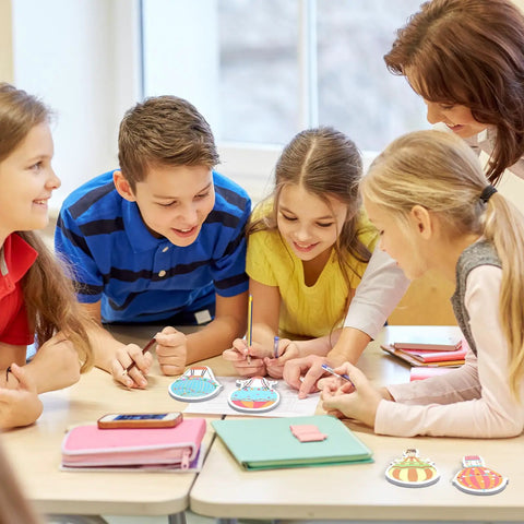 Group of children using Colorful Hot Air Balloon Sticky Notes Pack Of 12 Styles With 50 Sheets Each Mini Notebooks for classroom activity.