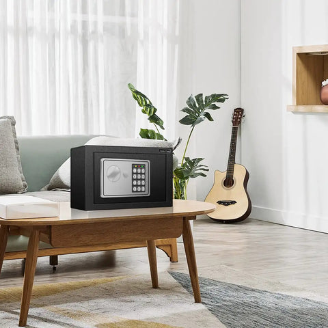 Living room with 25 Keys Cabinet With Sensor Light And Electronic Key Safe Pin Code Keyless Storage Box on a table
