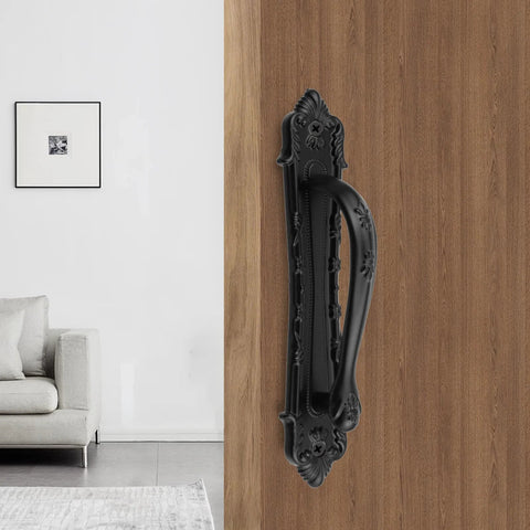 Vintage Black Sliding Barn Door Handle With Screws, Rustic Zinc Alloy Door Pull For Cabinets Gates Closets Sheds mounted on wooden door.