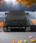 Front view of Jeep with Waterproof All Weather Jeep Wrangler Cover For 2 Door Models 1987 To 2026 in autumn setting