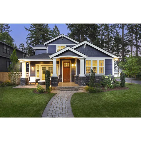 Front view of a modern house with lit windows and outdoor security flood light twin head LED dusk to dawn 1600 lumens white