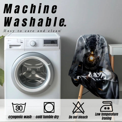 Steam Train Throw Blanket For Kids And Women on chair next to washing machine, emphasizing easy care and machine washable features.